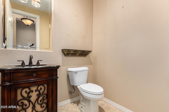 28247 N 128th Dr, Peoria, AZ 85383 - bathroom with toilet, tile patterned flooring, baseboards, and vanity