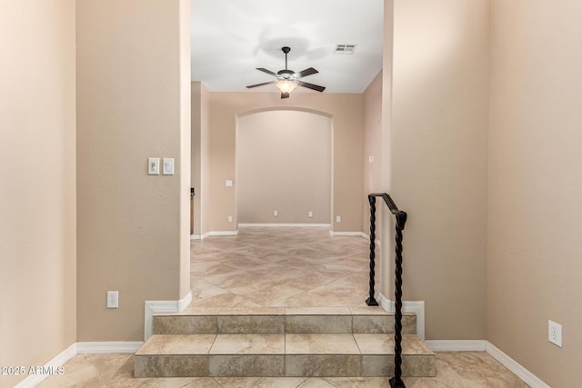 28247 N 128th Dr, Peoria, AZ 85383 - stairs featuring a ceiling fan, arched walkways, visible vents, and baseboards