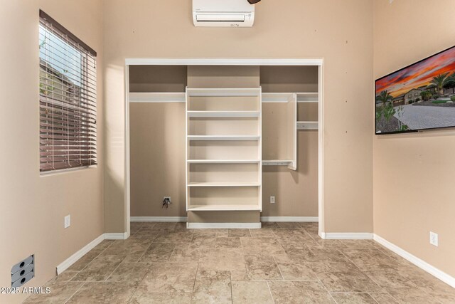 28247 N 128th Dr, Peoria, AZ 85383 - interior space featuring a wall mounted air conditioner