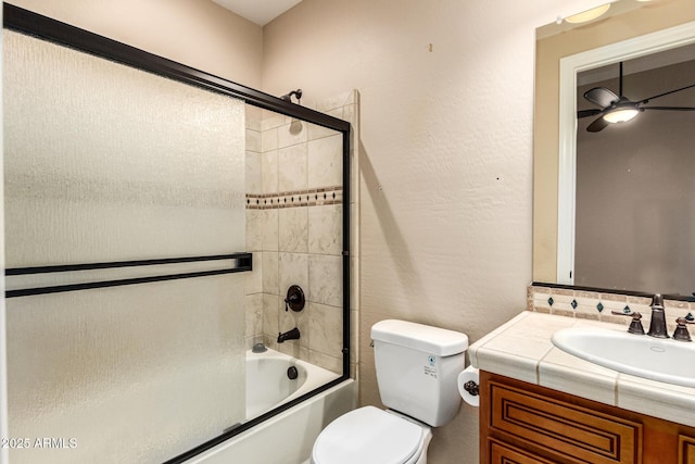 28247 N 128th Dr, Peoria, AZ 85383 - bathroom featuring ceiling fan, a textured wall, toilet, shower / bath combination with glass door, and vanity