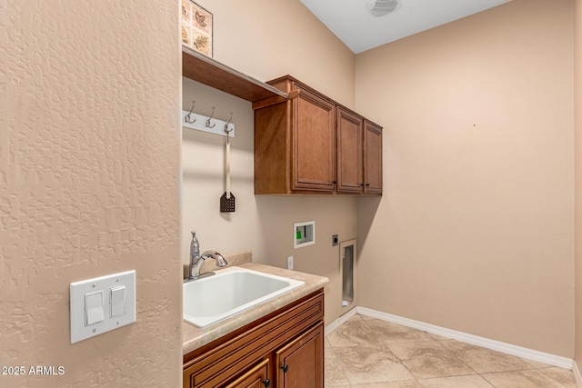 28247 N 128th Dr, Peoria, AZ 85383 - clothes washing area with cabinet space, baseboards, a sink, hookup for a washing machine, and electric dryer hookup