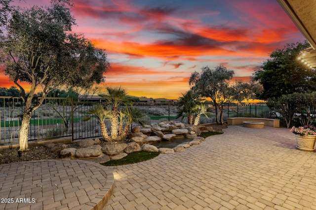 28247 N 128th Dr, Peoria, AZ 85383 - patio terrace at dusk featuring fence