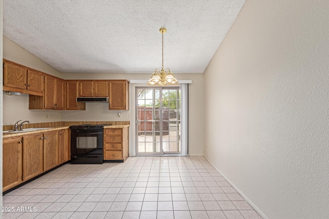 6711 W Osborn Rd Unit 82, Phoenix, AZ 85033 - kitchen featuring black stove, under cabinet range hood, a textured ceiling, a chandelier, and light countertops