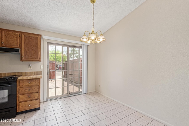 6711 W Osborn Rd Unit 82, Phoenix, AZ 85033 - unfurnished dining area with a chandelier, a textured ceiling, and light tile patterned floors