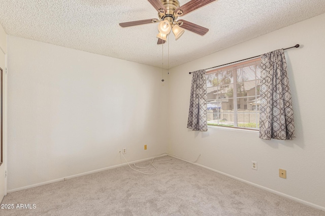 6711 W Osborn Rd Unit 82, Phoenix, AZ 85033 - empty room with a textured ceiling, carpet, and ceiling fan