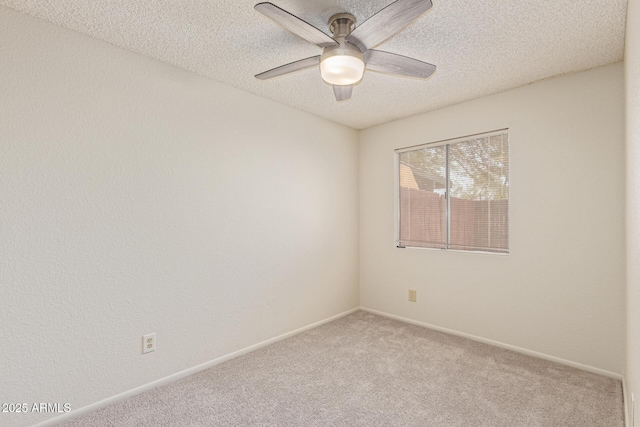 6711 W Osborn Rd Unit 82, Phoenix, AZ 85033 - empty room with carpet flooring, a ceiling fan, and a textured ceiling