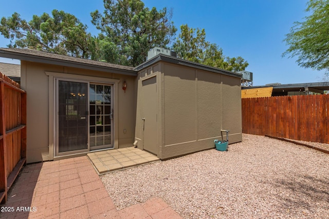 6711 W Osborn Rd Unit 82, Phoenix, AZ 85033 - rear view of property featuring stucco siding and a patio area