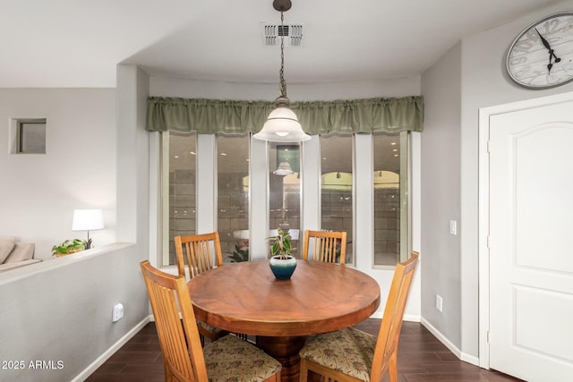 5628 N Rattler Way, Litchfield Park, AZ 85340 - dining room featuring dark wood finished floors and baseboards