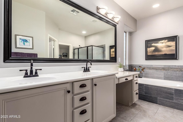 5628 N Rattler Way, Litchfield Park, AZ 85340 - bathroom featuring double vanity, a bath, a stall shower, tile patterned floors, and recessed lighting