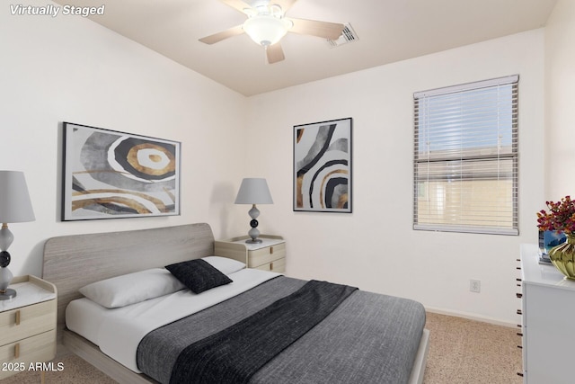 5628 N Rattler Way, Litchfield Park, AZ 85340 - bedroom with baseboards, ceiling fan, and carpet floors