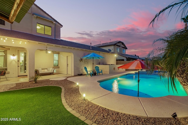 5628 N Rattler Way, Litchfield Park, AZ 85340 - view of swimming pool with a patio, a fenced backyard, and an outdoor hangout area