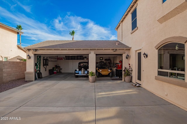5628 N Rattler Way, Litchfield Park, AZ 85340 - garage featuring concrete driveway