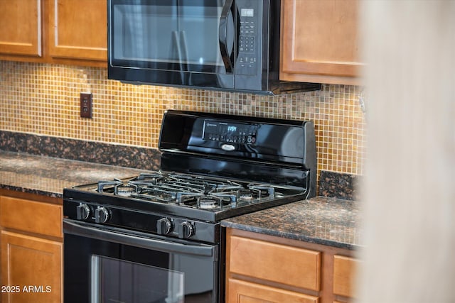 kitchen featuring tasteful backsplash, brown cabinets, and black appliances