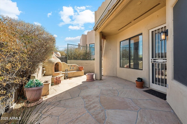 view of patio / terrace with fence