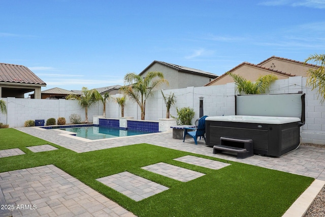 view of yard with central AC, a pool with hot tub, and a patio area