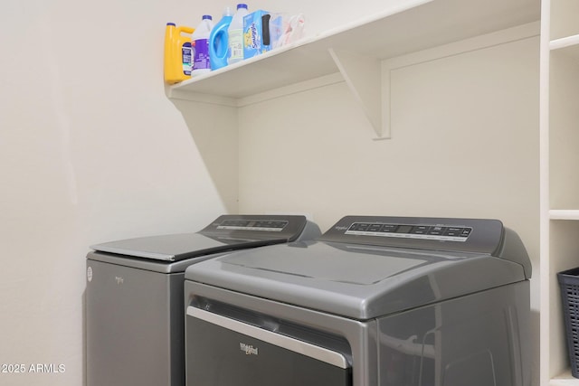 laundry room with washer and dryer