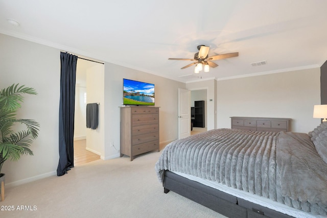 carpeted bedroom featuring ceiling fan and ornamental molding