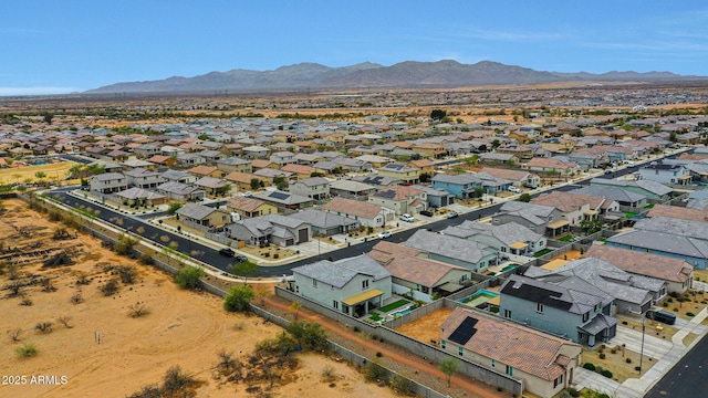 drone / aerial view with a residential view and a mountain view