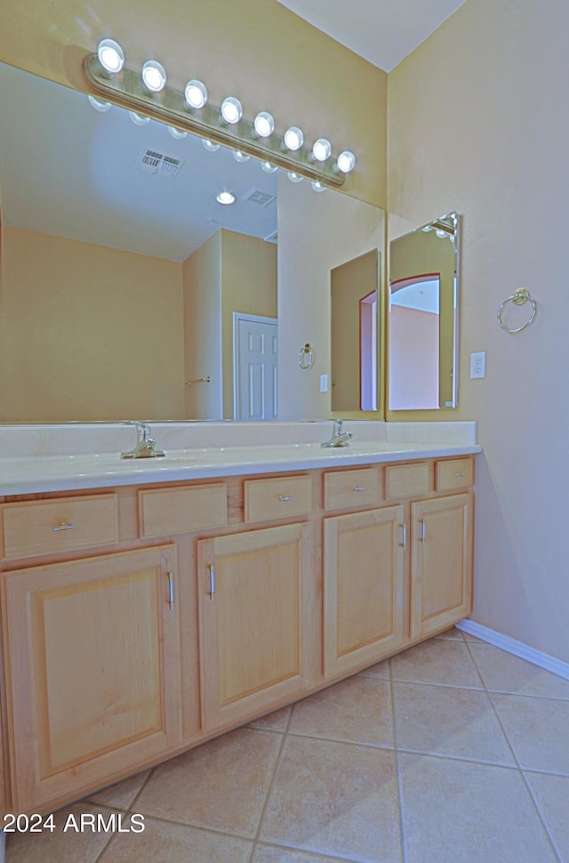 bathroom with vanity and tile patterned floors