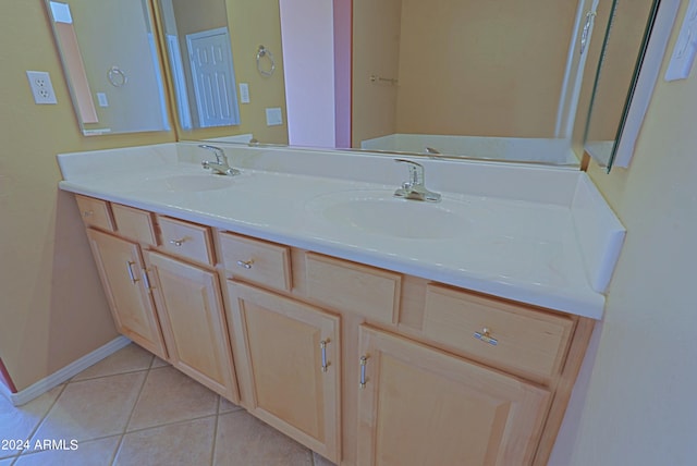 bathroom featuring tile patterned floors and vanity