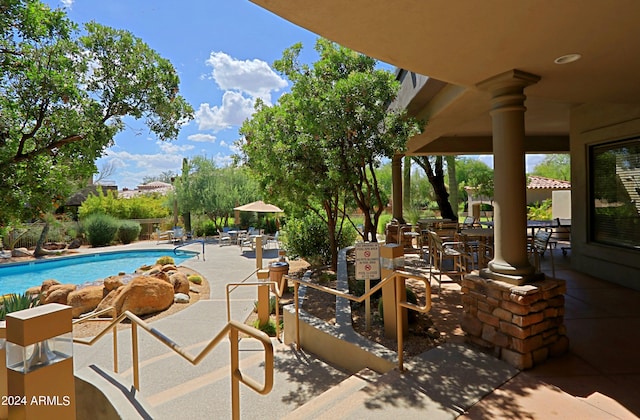 view of patio / terrace with a community pool