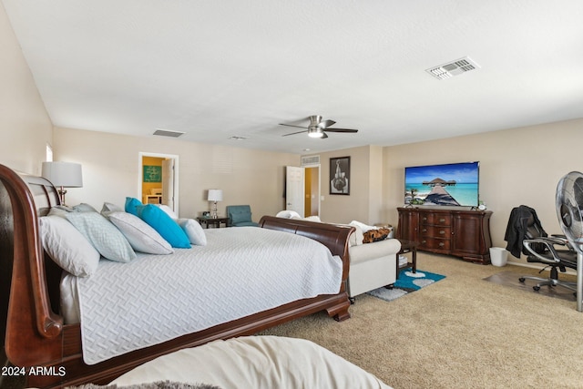 bedroom with ceiling fan and carpet floors