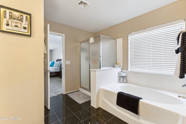 bathroom featuring plus walk in shower