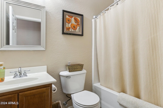 full bathroom featuring shower / bath combo with shower curtain, vanity, and toilet