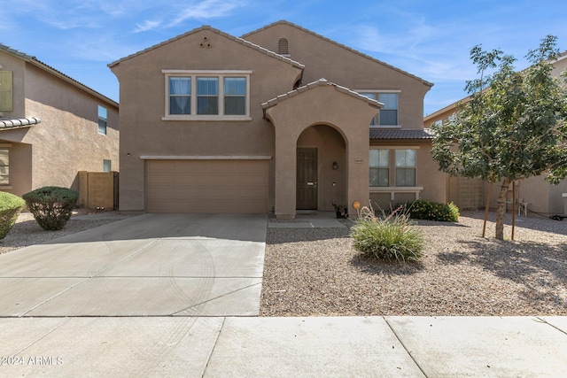 view of front of property featuring a garage