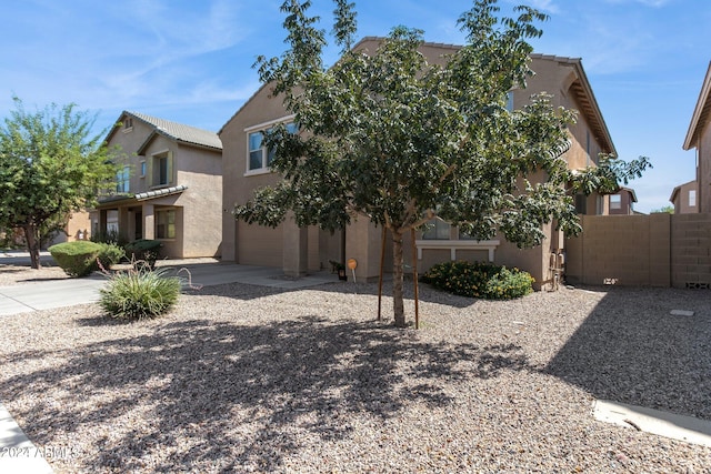 view of front of property featuring a garage