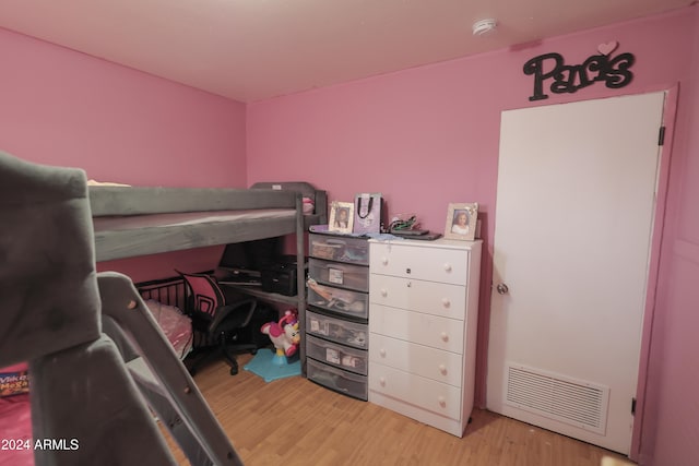 bedroom featuring light wood-type flooring