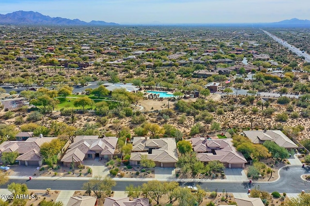 bird's eye view with a mountain view