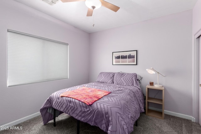 bedroom with visible vents, baseboards, carpet, and ceiling fan