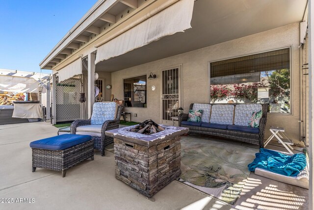 19930 N 98th Ave, Peoria, AZ 85382 - view of patio / terrace with an outdoor living space with a fire pit