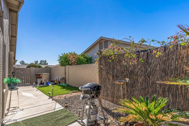 19930 N 98th Ave, Peoria, AZ 85382 - fenced backyard featuring a patio