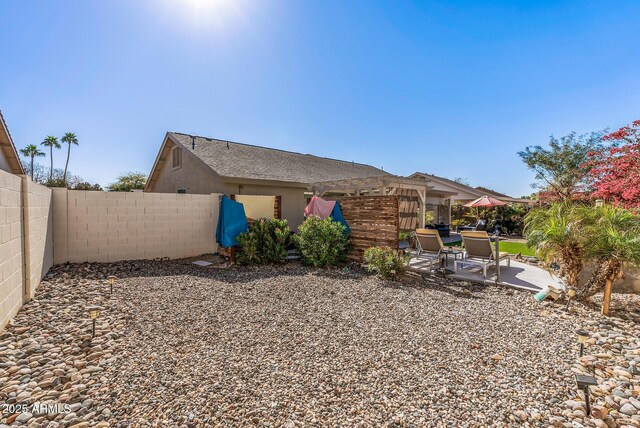 19930 N 98th Ave, Peoria, AZ 85382 - rear view of property with a patio area