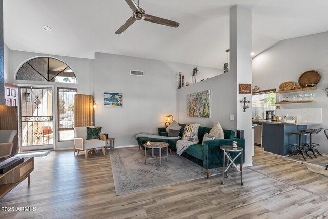 19930 N 98th Ave, Peoria, AZ 85382 - living area featuring high vaulted ceiling, ceiling fan, and wood finished floors