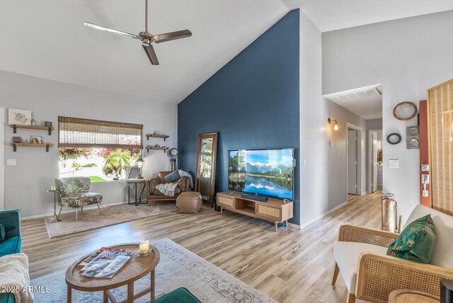 19930 N 98th Ave, Peoria, AZ 85382 - living area with high vaulted ceiling, a ceiling fan, wood finished floors, and baseboards
