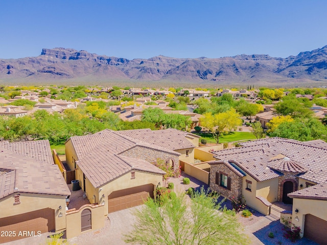 bird's eye view featuring a mountain view and a residential view