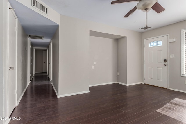 foyer featuring dark hardwood / wood-style flooring and ceiling fan