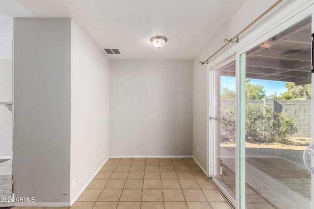 view of tiled spare room