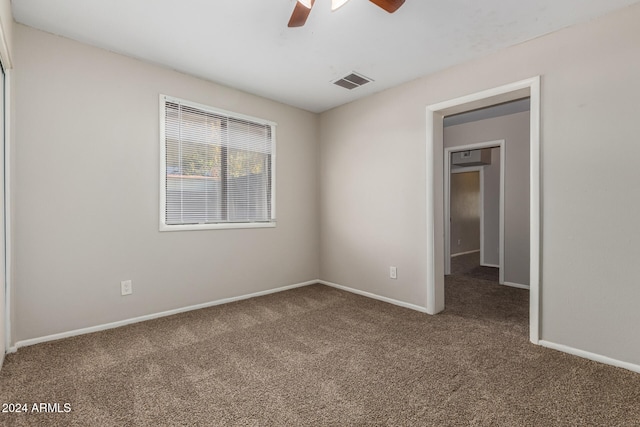 unfurnished room featuring carpet flooring and ceiling fan