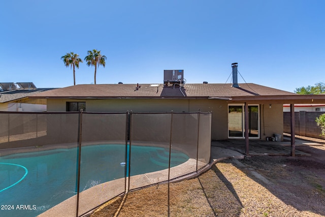 view of pool with central AC