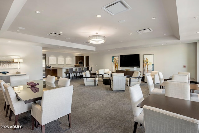 15215 N Kierland Blvd Unit 101, Scottsdale, AZ 85254 - dining space featuring a raised ceiling, carpet, and recessed lighting