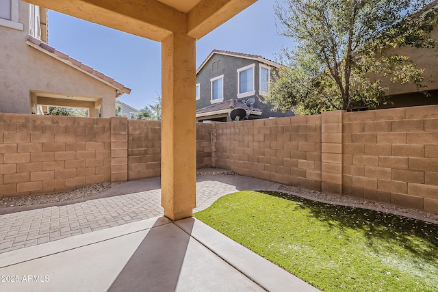 view of patio with a fenced backyard