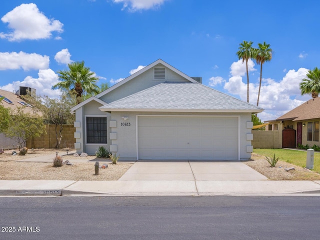10613 S 41st Pl, Phoenix, AZ 85044 - ranch-style home with roof with shingles, concrete driveway, an attached garage, and stucco siding