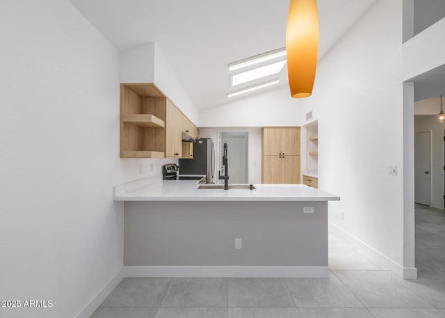 10613 S 41st Pl, Phoenix, AZ 85044 - kitchen with open shelves, vaulted ceiling, a peninsula, light countertops, and light tile patterned floors