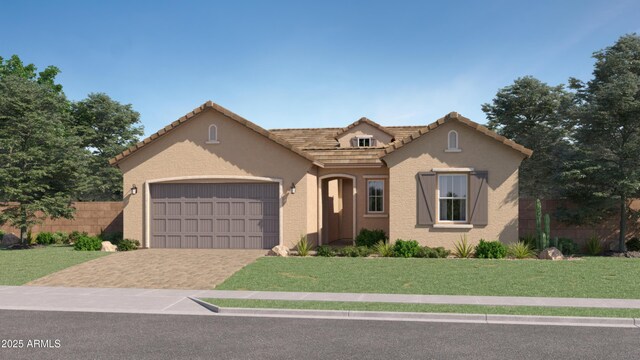 4784 S 232nd Ln, Buckeye, AZ 85326 - mediterranean / spanish home with stucco siding, a front lawn, and a garage