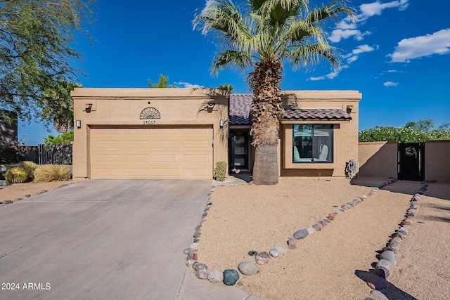 view of front of property featuring a garage