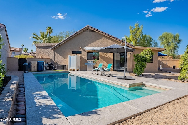 rear view of property with a patio area